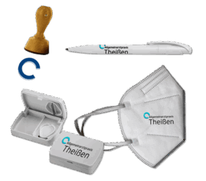 Branded giveaways such as a stamp, a pill box, a biro and an FFP2 mask