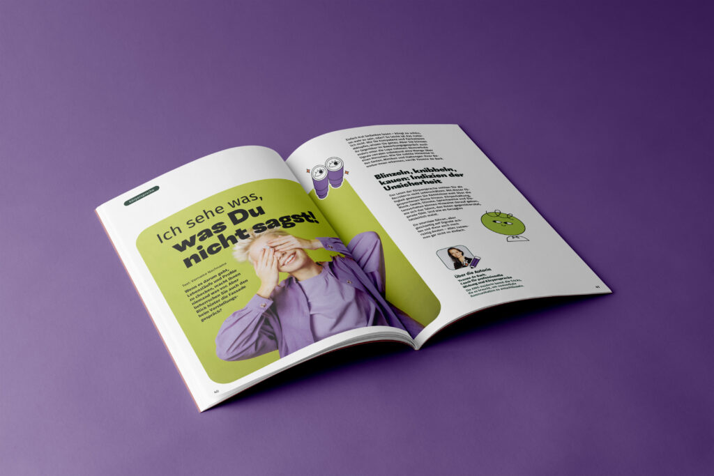 A spread on body language in job interviews. A young lady holding her eyes shut and laughing. Headline: I spy with my little eye…